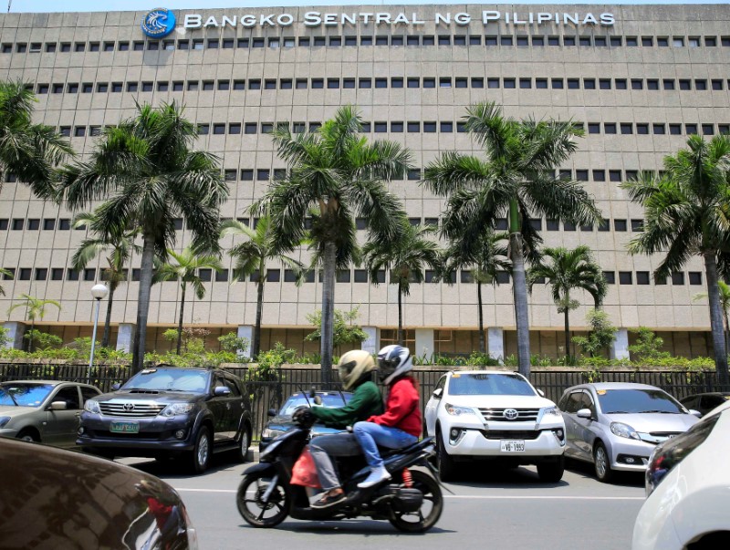 Philippines central bank keeps rates steady, but ready to resume hikes if needed