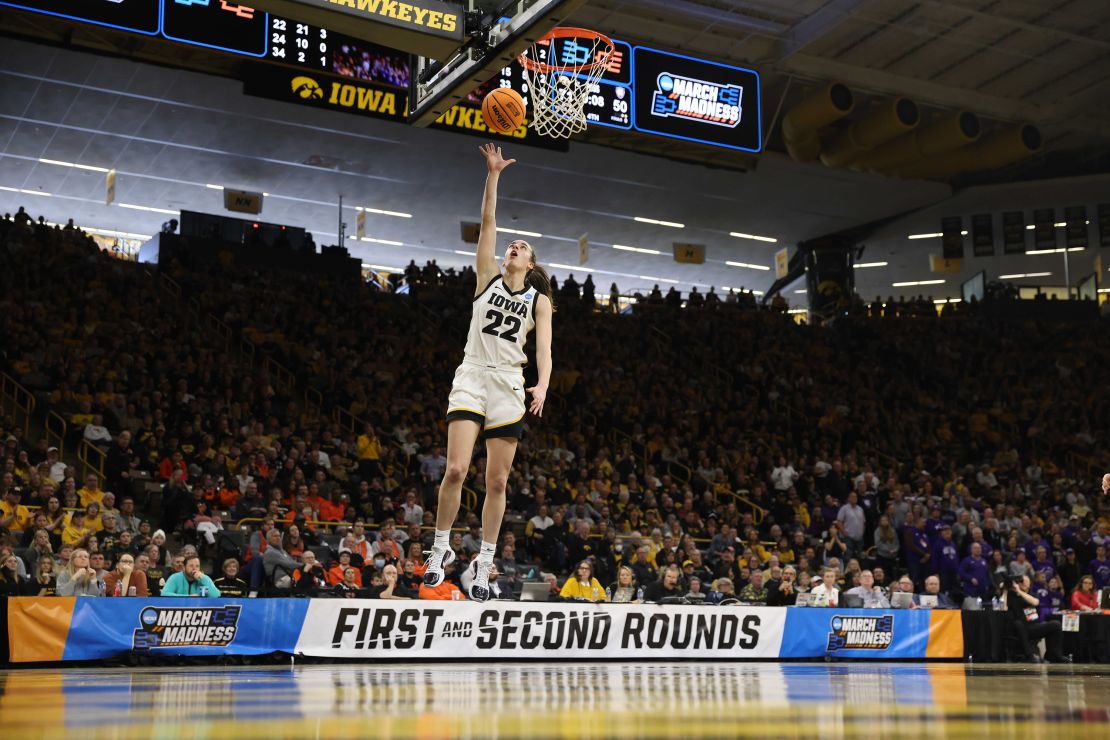 IOWA CITY, IOWA - MARCH 23: Caitlin Clark #22 of the Iowa Hawkeyes lays up a basket against the Holy Cross Crusaders during the first round of the 2024 NCAA Women's Basketball Tournament held at Carver-Hawkeye Arena on March 23, 2024 in Iowa City, Iowa. (Photo by Rebecca Gratz/NCAA Photos via Getty Images)