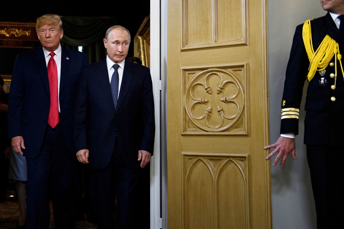 President Donald Trump, left, and and Russia President Vladimir Putin arrive for a meeting in Helsinki on July 16, 2018. 