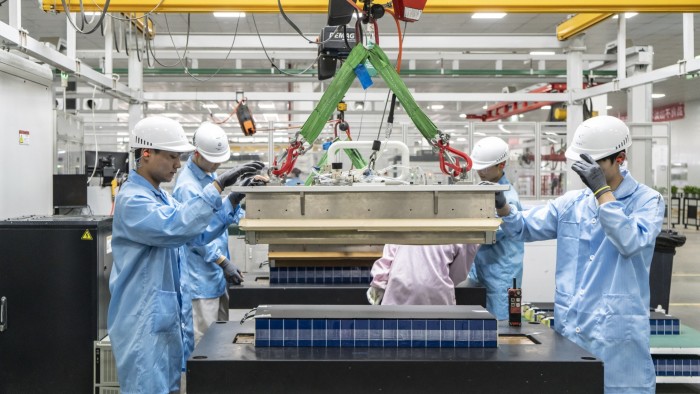 China’s economy loses momentum as trade pressures weigh